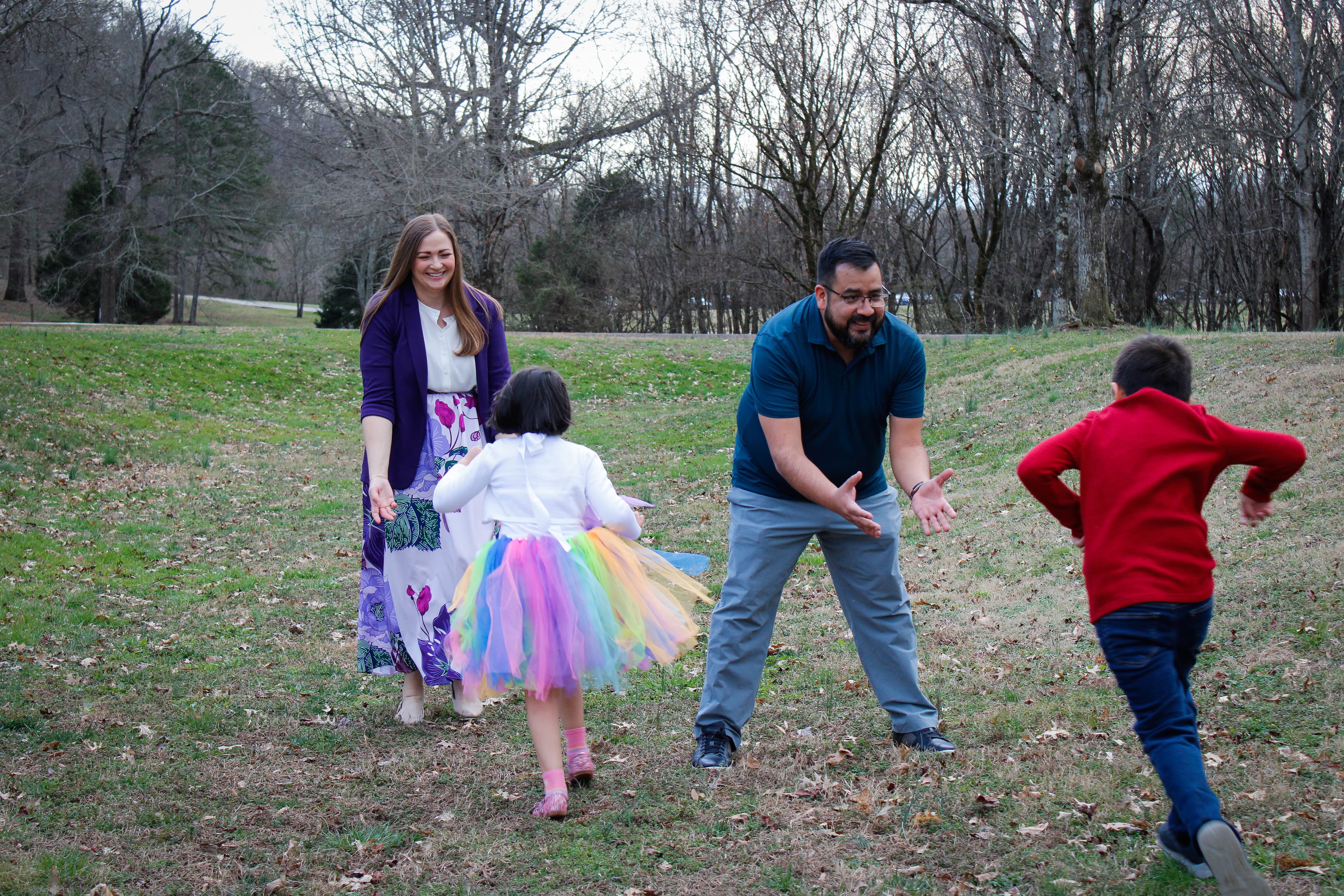 Ruth Walker playing outdoors with her family